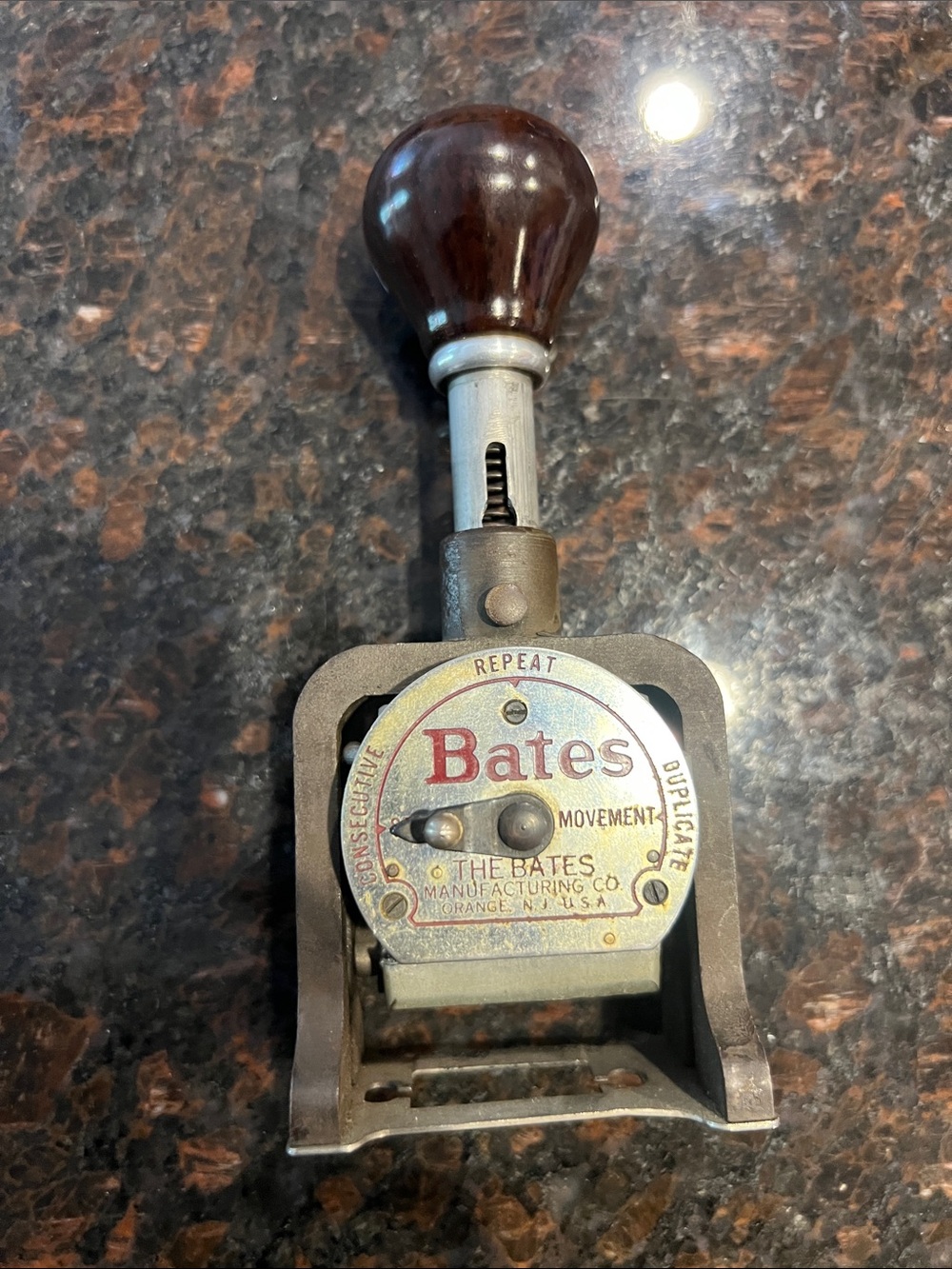 Bates Hand Numbering Machine in Brown and Brass Tones vintage.